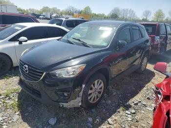  Salvage Mazda Cx